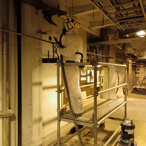 Kaapelihyllyjen asbestiputsaus